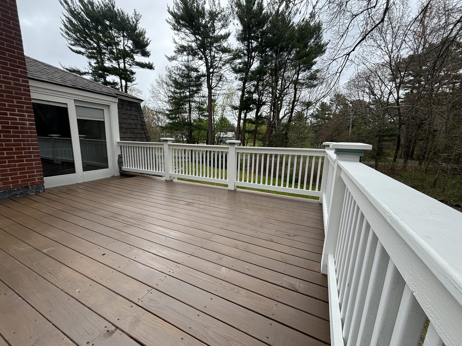 Finished deck with white railing