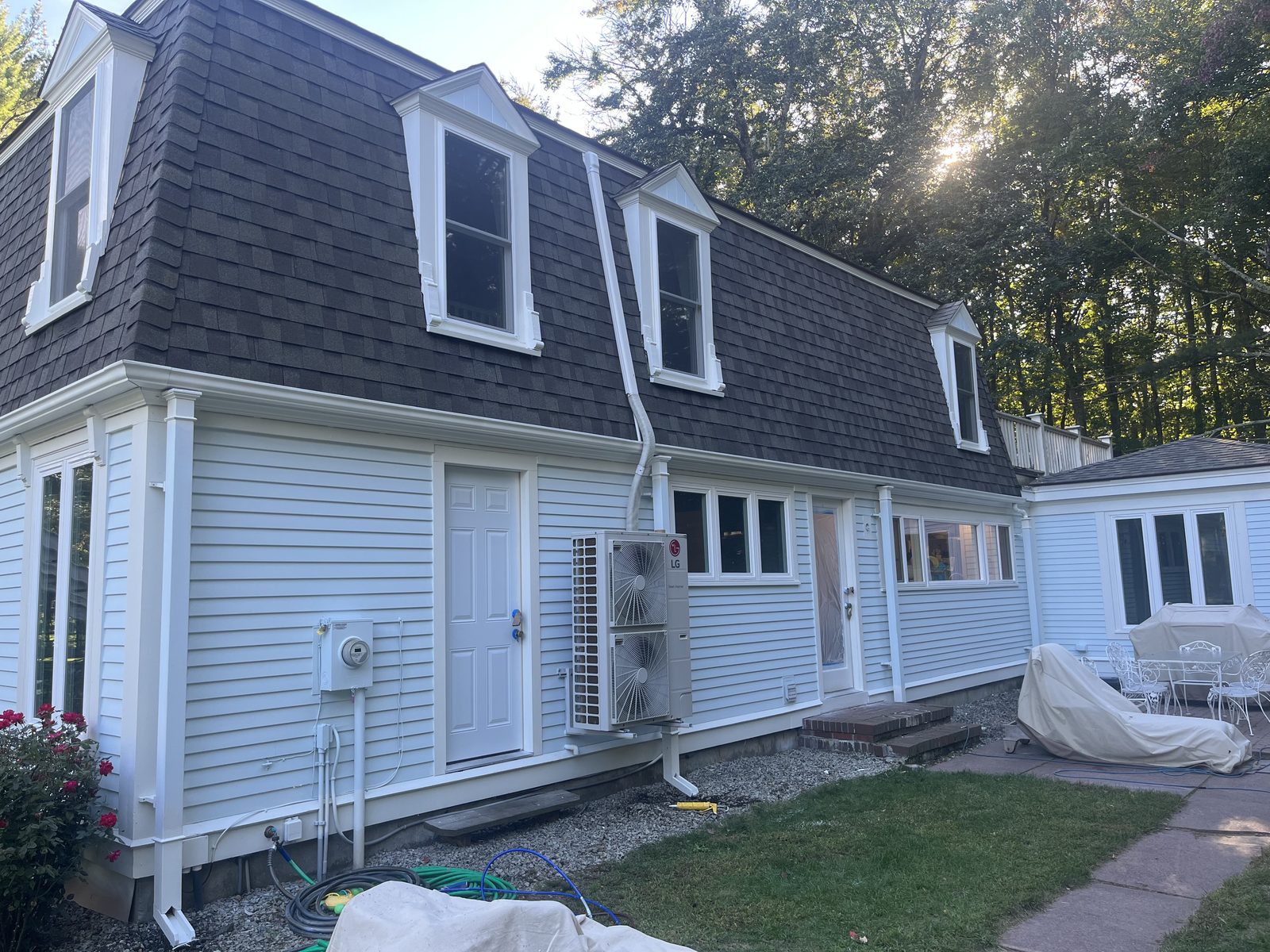 Finished home exterior, new siding and trim